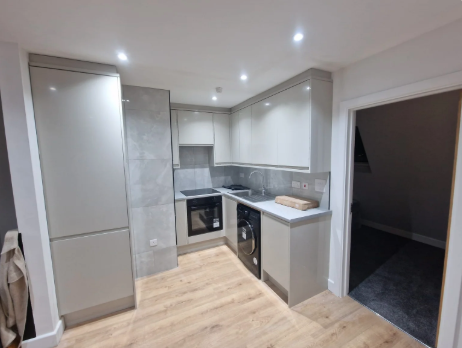 Kitchen renovation with grey cabinets by BL Builders London